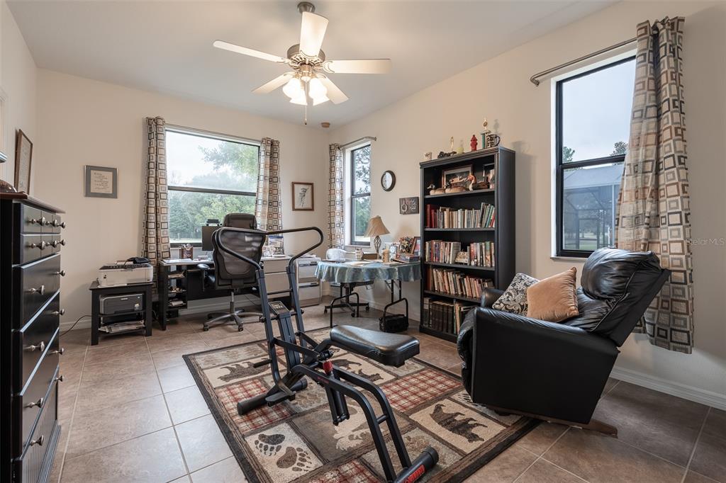 15969 Southwest 14th Avenue Road Ocala, FL 34473 - Photo 26 of 46 a living room with furniture and a window