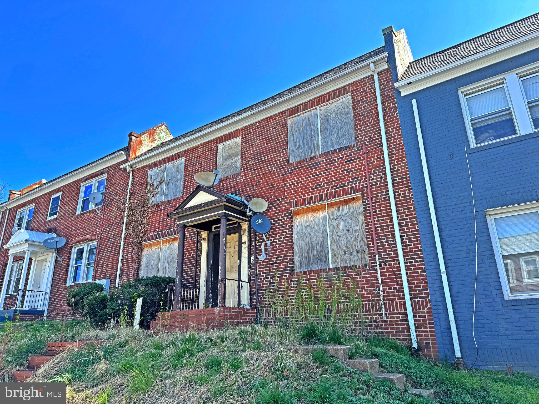 a front view of a house having yard