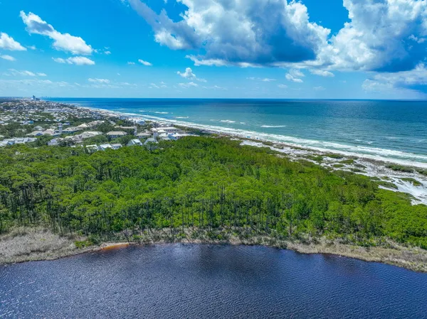 a view of an ocean and a yard