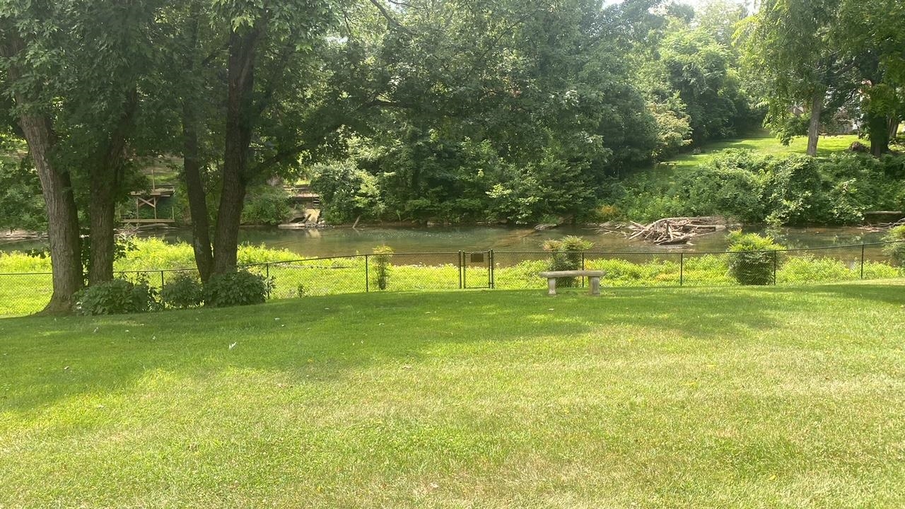 700 Rife Road, Unit 7F Waynesboro, VA 22980 - Photo 4 of 20 a view of a golf course with a lake