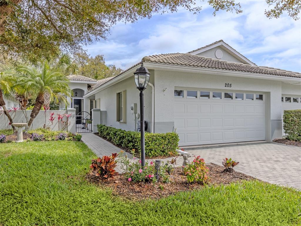 205 Reclinata Circle Venice, FL 34292 - Photo 1 of 62 front view of a house with a yard