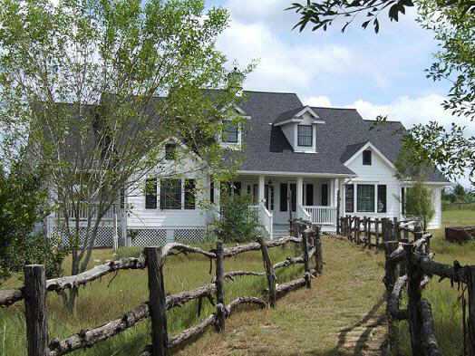 a front view of house with outdoor seating
