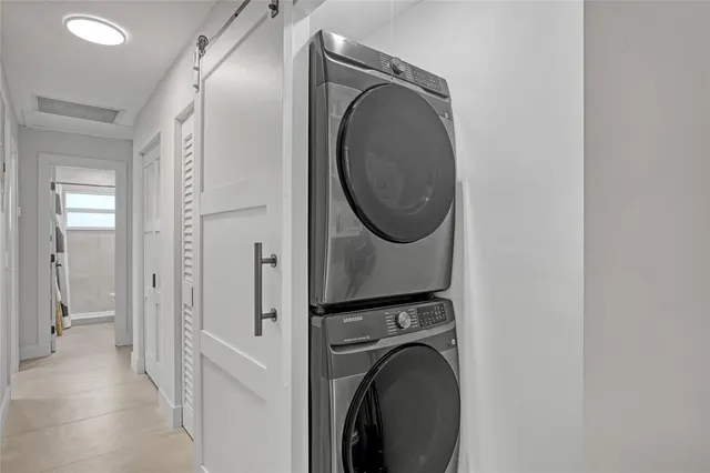 a bedroom with bed and a window