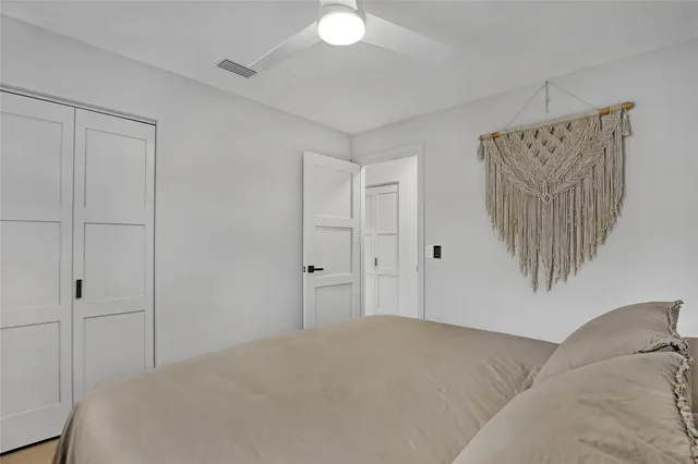 a bathroom with a bathtub shower sink and toilet