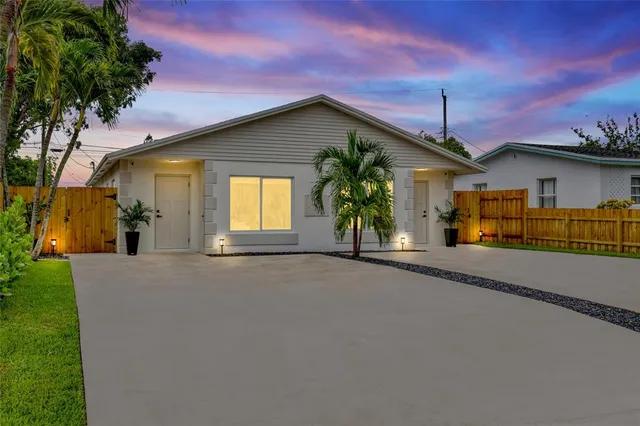 a view of house with outdoor space and porch