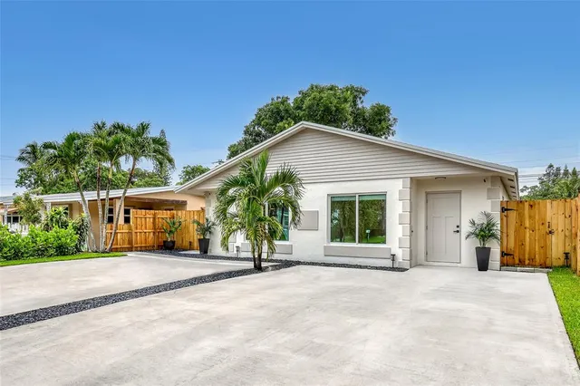 a view of potted plant in front of a door
