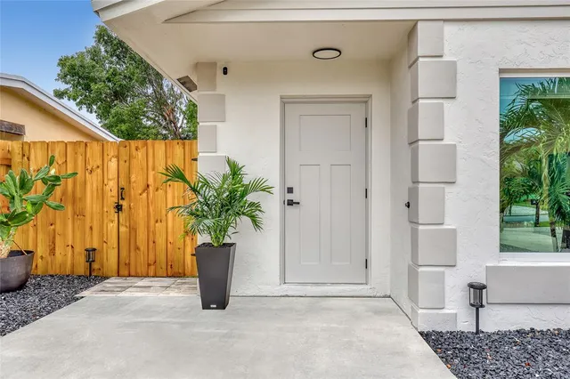 a living room with a couch and a window