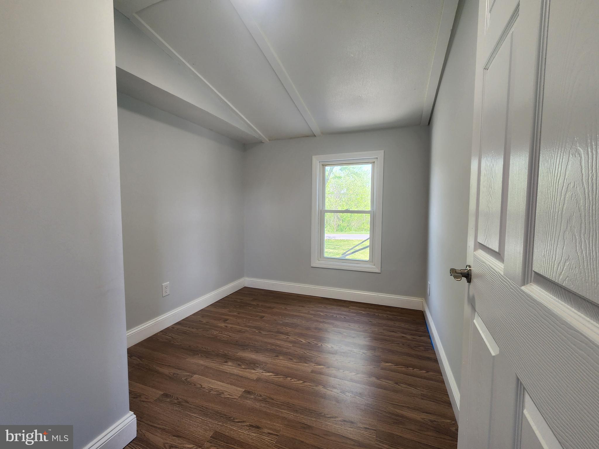 41 Mountain View Terrace Newville, PA 17241 - Photo 19 of 34 a view of an empty room with wooden floor and a window