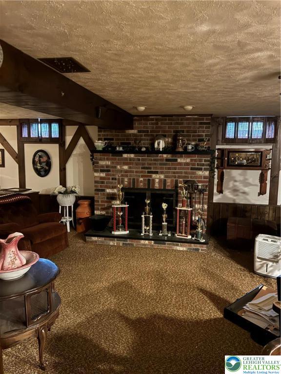 195 Bangor Junction Road Bangor, PA 18013 - Photo 13 of 16 a living room with furniture a flat screen tv and outdoor seating