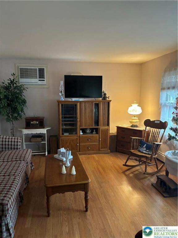 195 Bangor Junction Road Bangor, PA 18013 - Photo 7 of 16 a living room with furniture a flat screen tv and a table