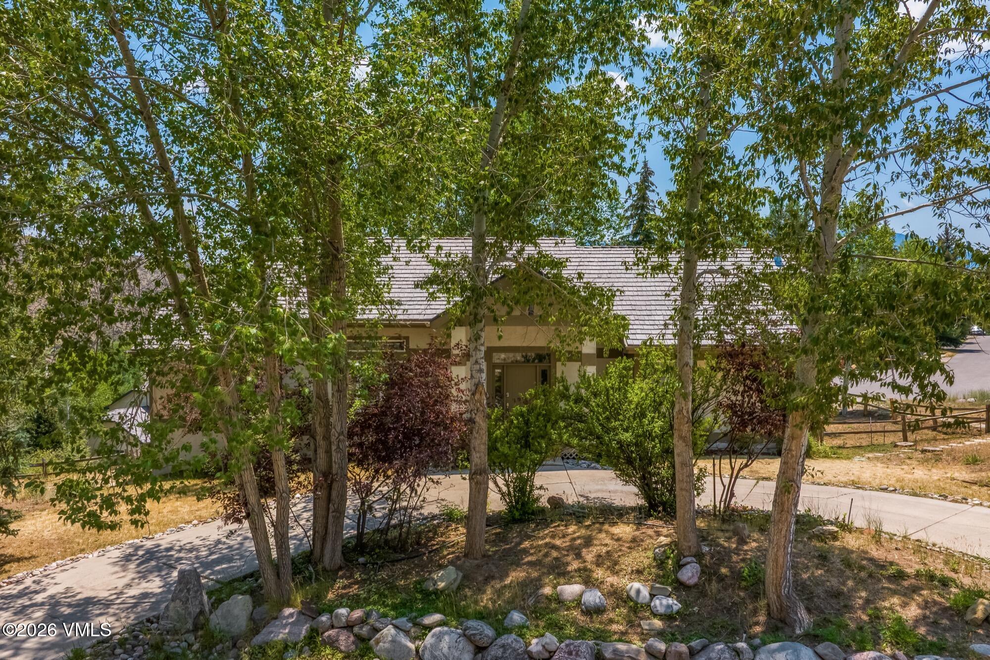 1671 Winslow Road Edwards, CO 81632 - Photo 47 of 48 a view of a yard with plants and trees