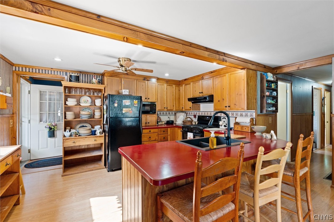 1548 West Genesee St Road Aurelius, NY 13021 - Photo 13 of 39 Breakfast bar overlooks kitchen