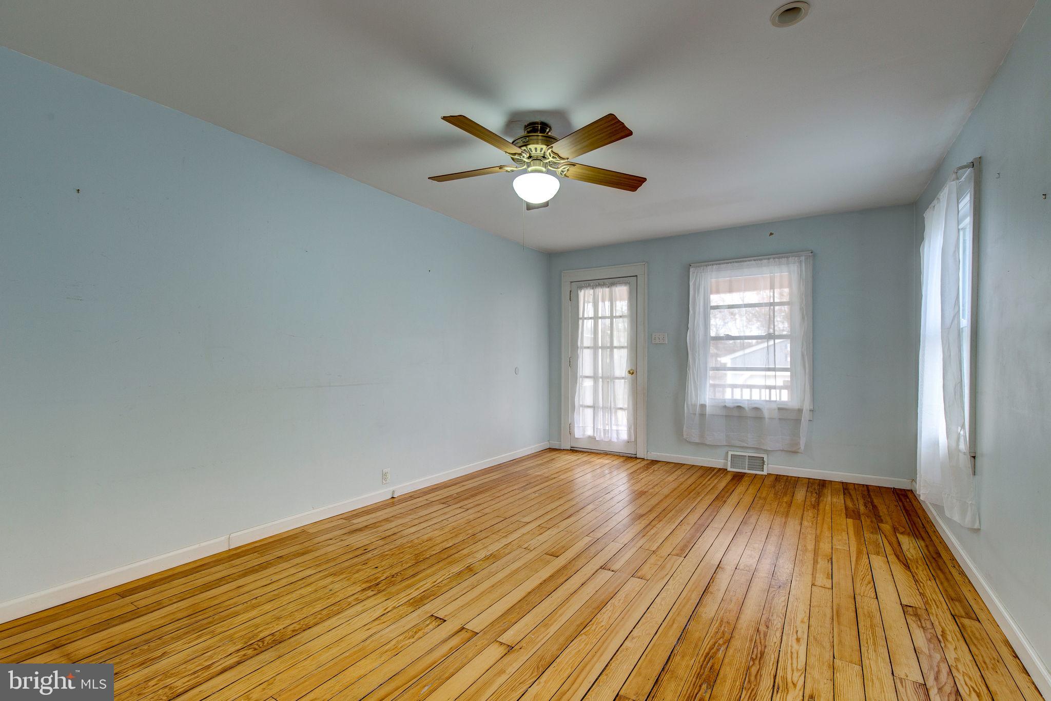 1002 Rutledge Avenue Phoenixville, PA 19460 - Photo 9 of 22 Living room with timeless pine flooring