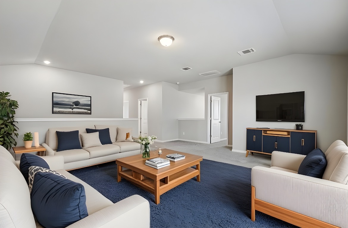 1007 Guadalupe Bass Road Hutto, TX 78634 - Photo 24 of 39 Virtual Staged Carpeted living area with lofted ceiling and recessed lighting