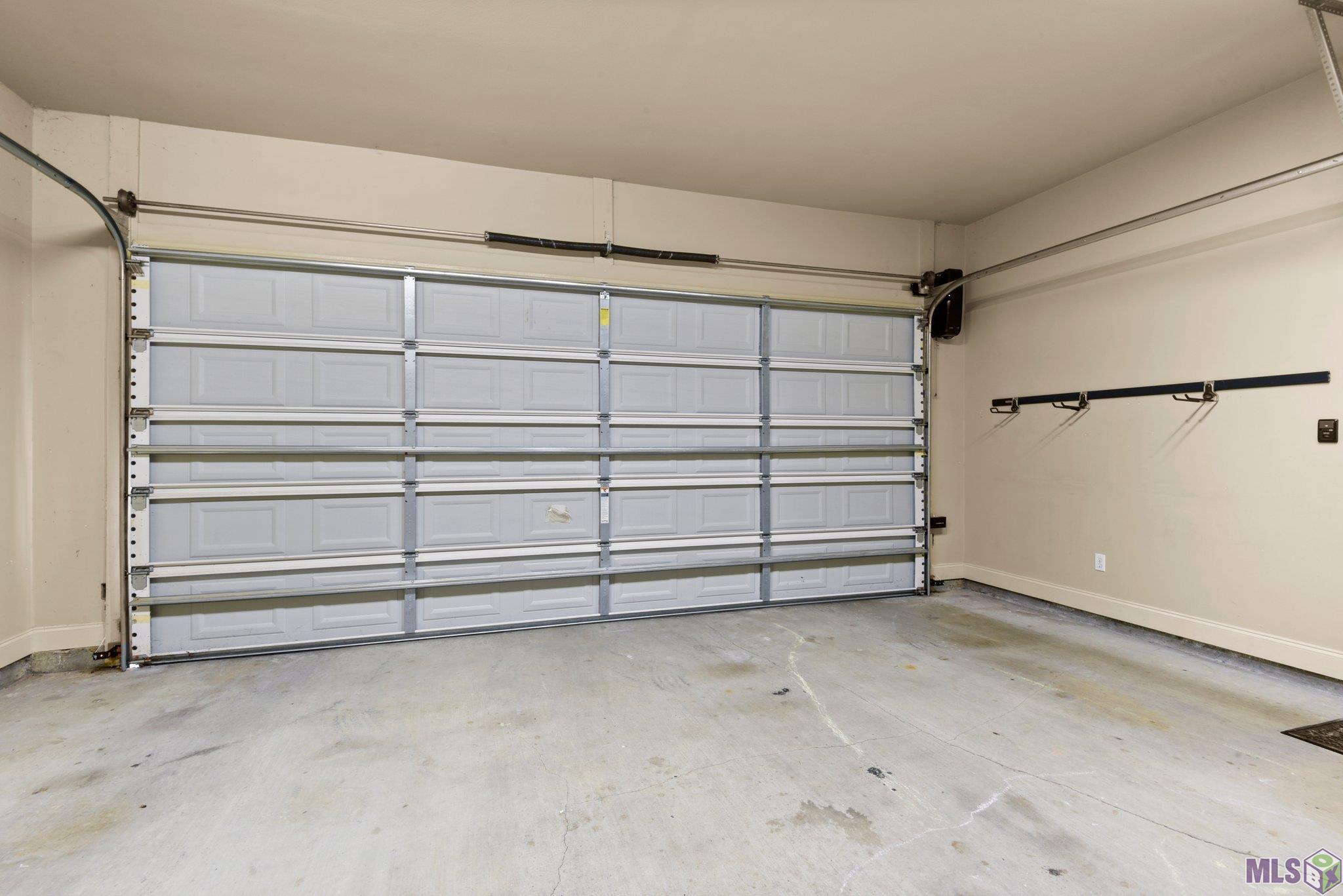 8873 Foxgate Drive Baton Rouge, LA 70809 - Photo 20 of 33 Smart Garage Door Opener