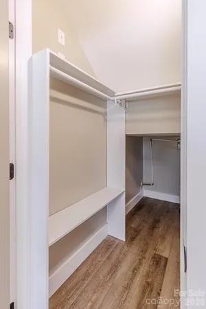 a view of an empty walk in closet