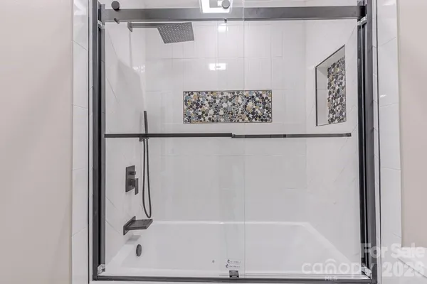 a bathroom with a bathtub