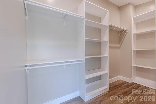 a view of an empty walk in closet