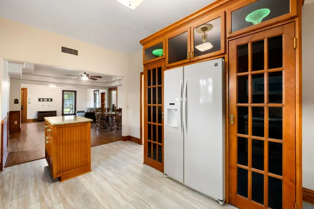 a view of a living room and wooden floor