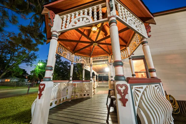 a view of a building with a yard