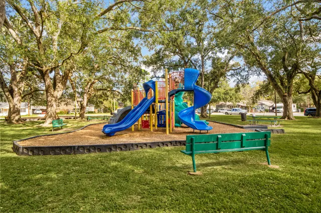 a view of a park with swings