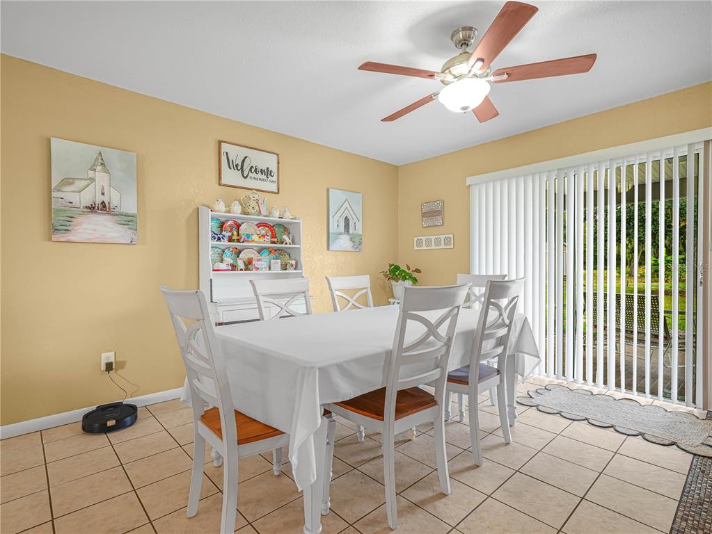 3963 Mammoth Grove Road Lake Wales, FL 33898 - Photo 15 of 42 a view of a dining room with furniture