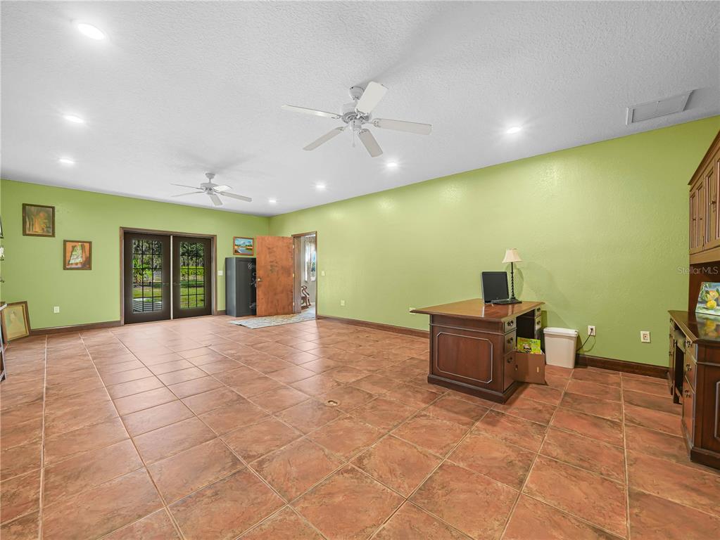 3963 Mammoth Grove Road Lake Wales, FL 33898 - Photo 17 of 42 a view of a livingroom with furniture and a window