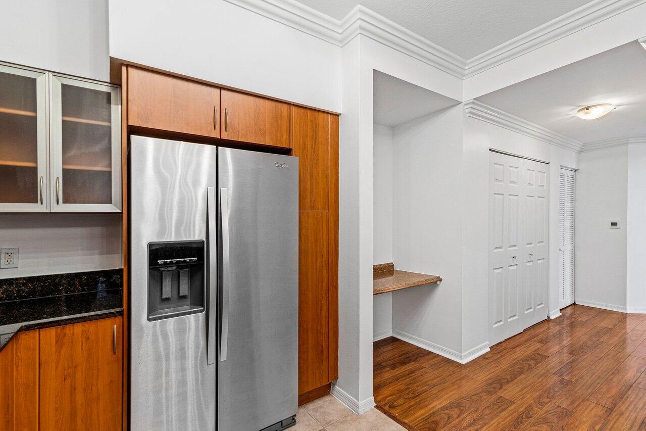 233 South Federal Highway, Unit 408 Boca Raton, FL 33432 - Photo 13 of 48 a bedroom with a bed and a window