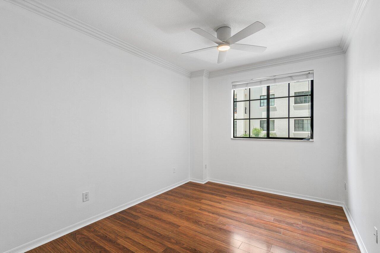 233 South Federal Highway, Unit 408 Boca Raton, FL 33432 - Photo 21 of 48 wooden floor in an empty room with a window
