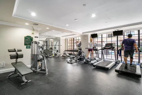 a view of a room with gym equipment