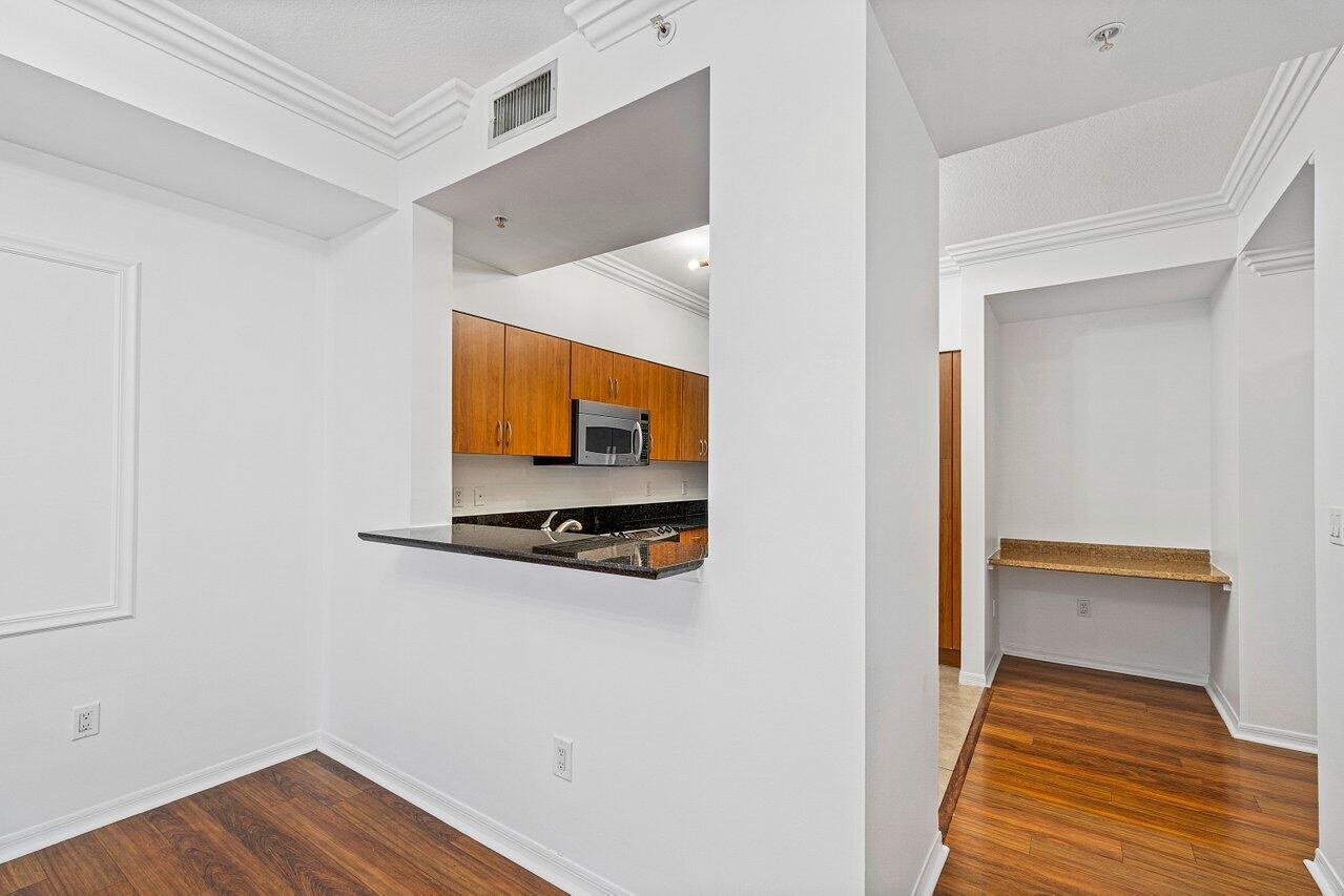 233 South Federal Highway, Unit 408 Boca Raton, FL 33432 - Photo 9 of 48 a view of an entryway with wooden floor