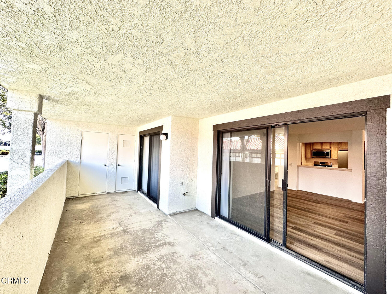 2025 Majorca Drive Oxnard, CA 93035 - Photo 16 of 28 a view of a big room with wooden floor and windows