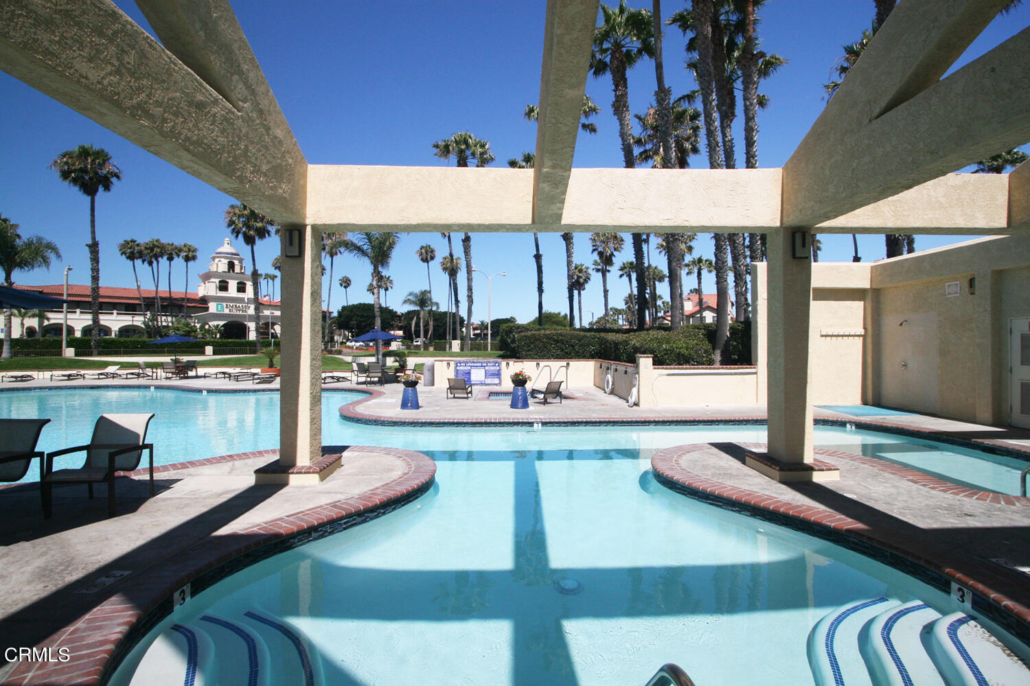 2025 Majorca Drive Oxnard, CA 93035 - Photo 21 of 28 a view of a patio with a table and chairs