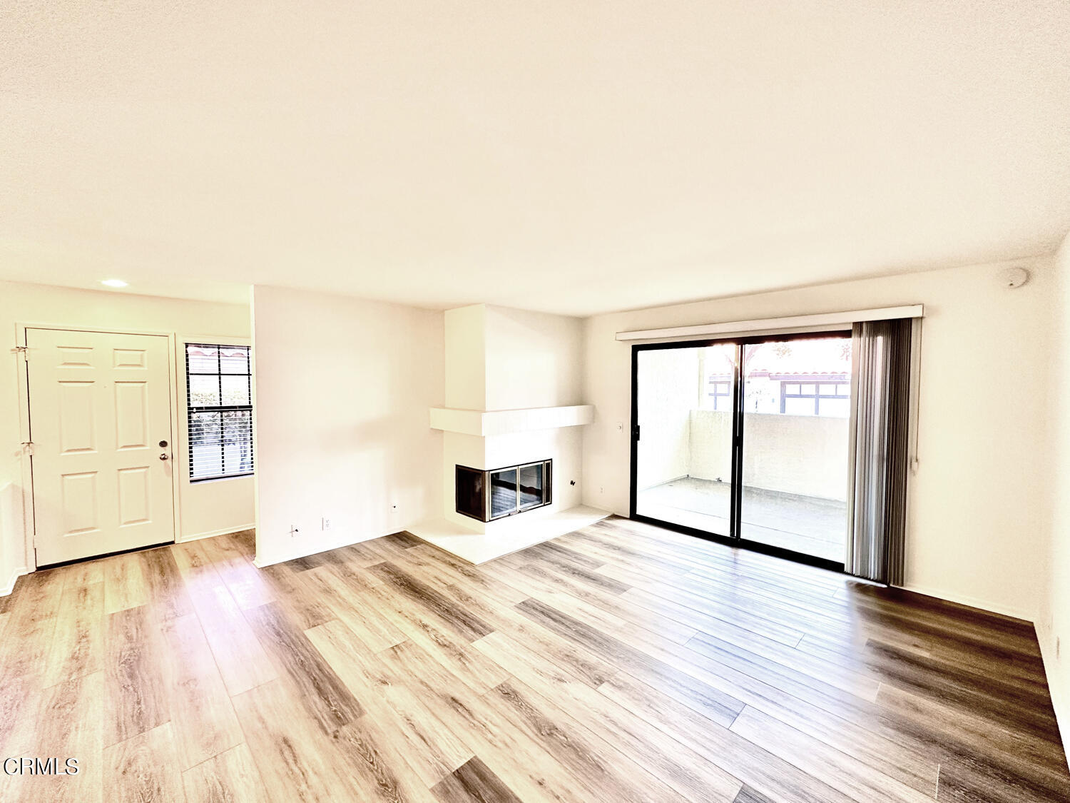 2025 Majorca Drive Oxnard, CA 93035 - Photo 6 of 28 a view of empty room with wooden floor and fan