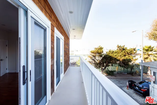 a view of a terrace with wooden floor