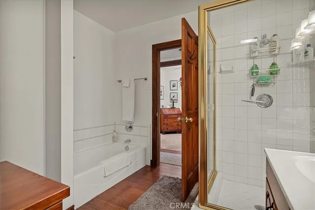 a bedroom with a large bed and a closet