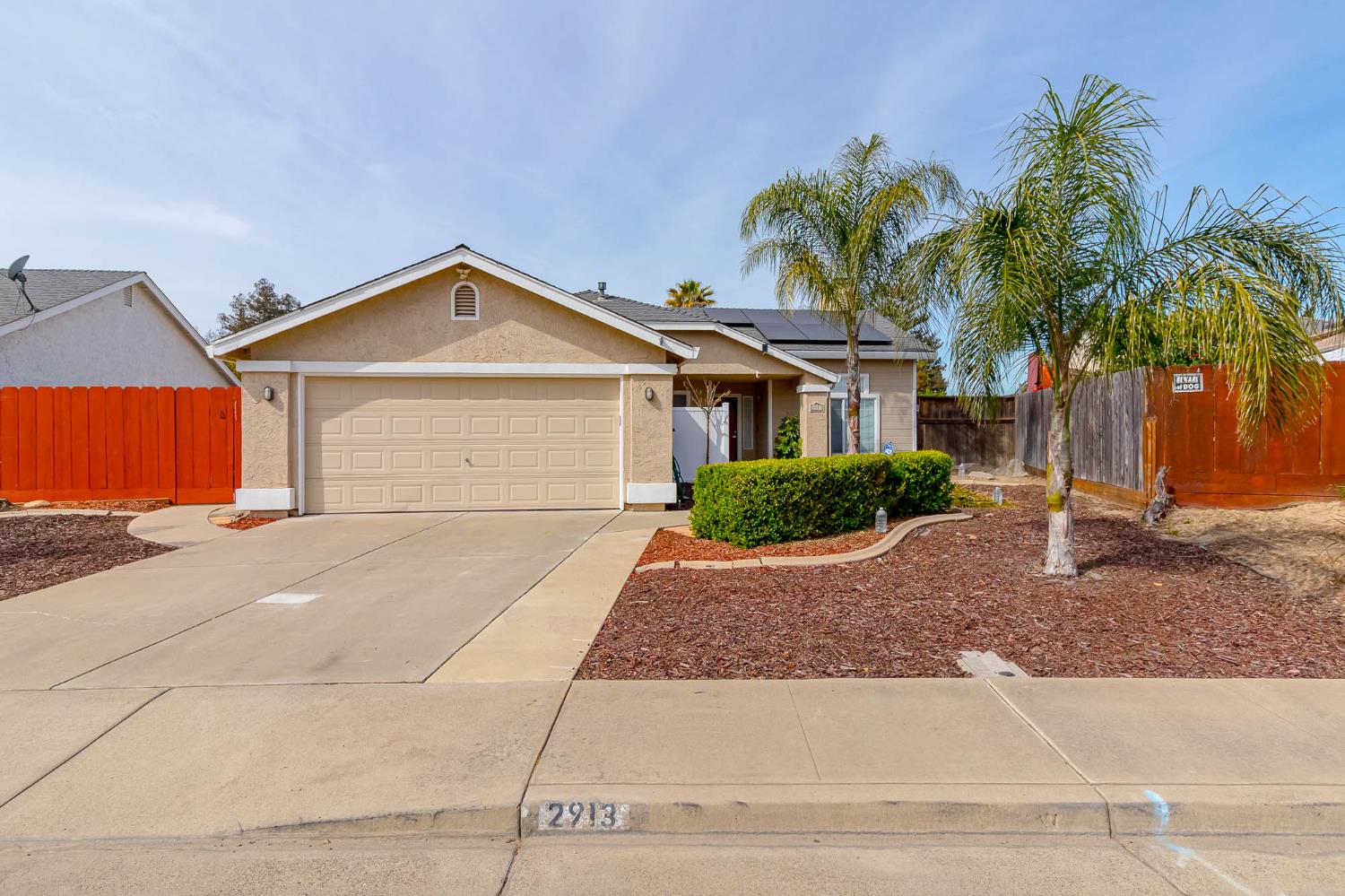 2913 Soquel Avenue Atwater, CA 95301 - Photo 1 of 29 a front view of a house with a yard