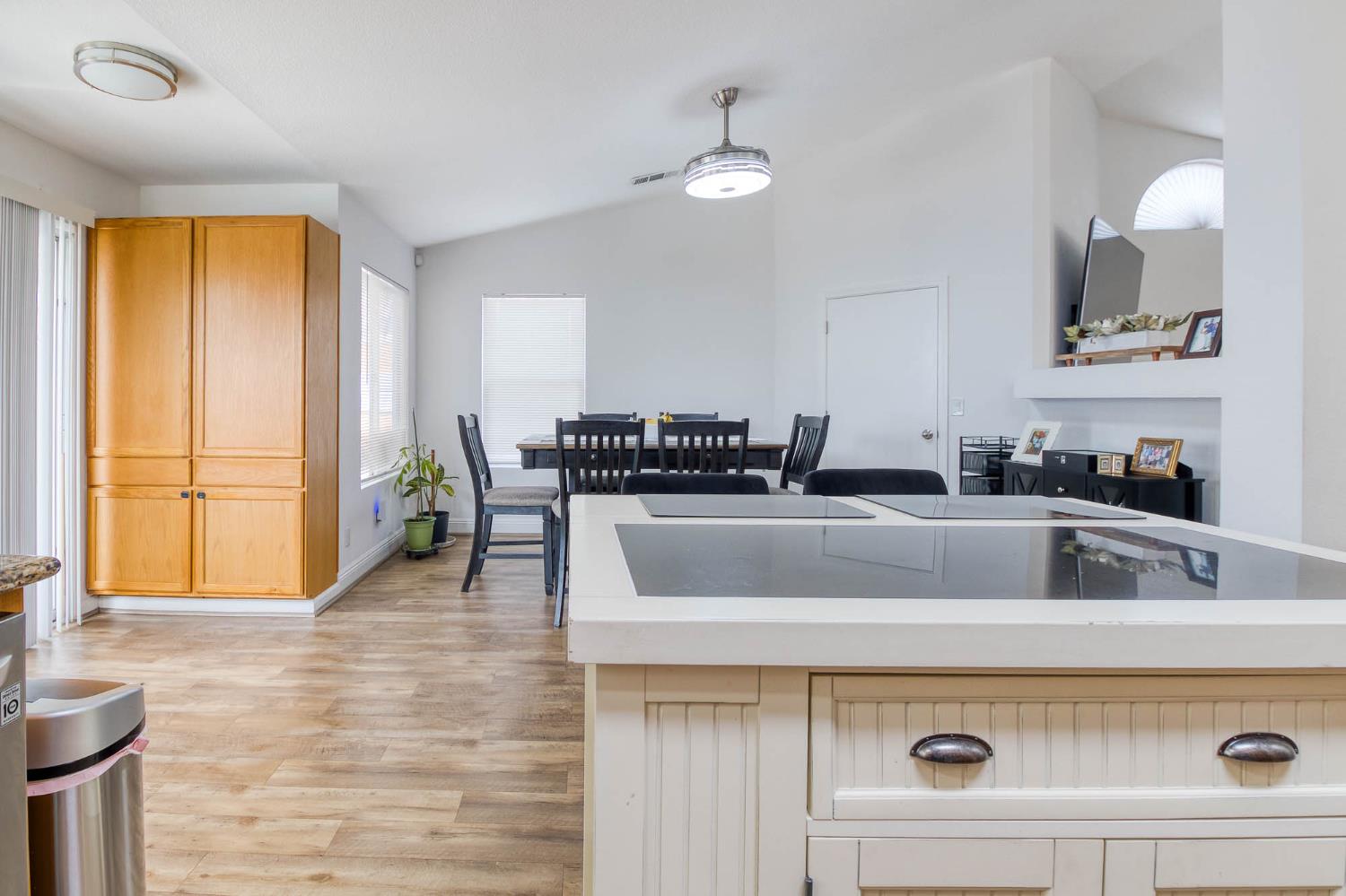 2913 Soquel Avenue Atwater, CA 95301 - Photo 15 of 29 a kitchen with a sink and a refrigerator