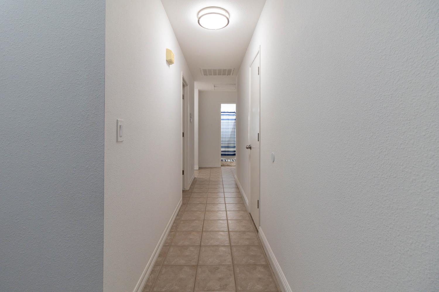 2913 Soquel Avenue Atwater, CA 95301 - Photo 17 of 29 a view of a hallway