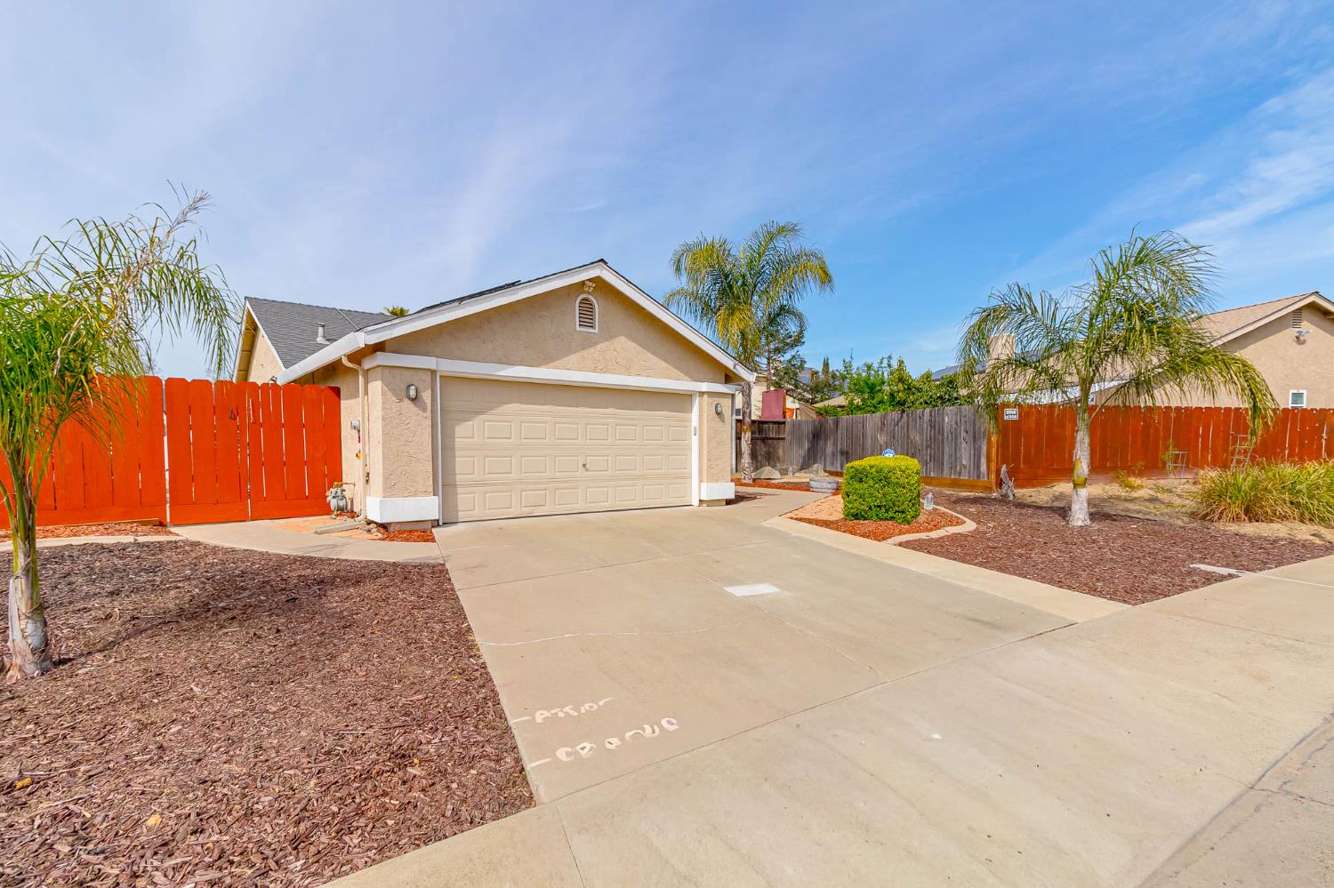 2913 Soquel Avenue Atwater, CA 95301 - Photo 3 of 29 a view of a house with a yard and a garage