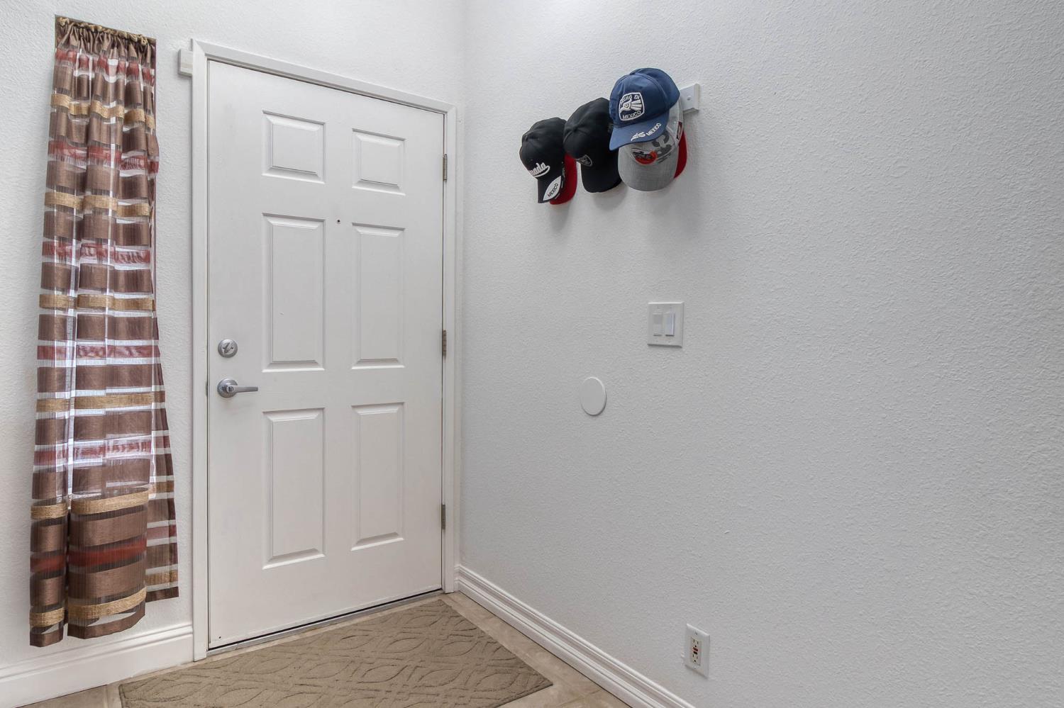 2913 Soquel Avenue Atwater, CA 95301 - Photo 5 of 29 a view of a room that has a window and cabinet in it