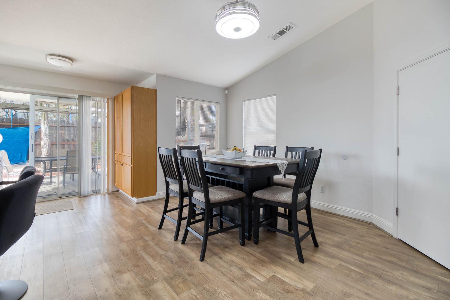 2913 Soquel Avenue Atwater, CA 95301 - Photo 9 of 29 a view of a dining room with furniture and wooden floor