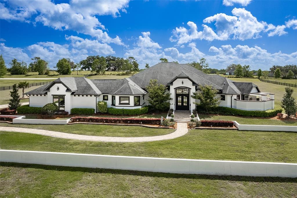 7121 Northeast 22nd Ct Road Ocala, FL 34479 - Photo 1 of 1 a view of houses with yard