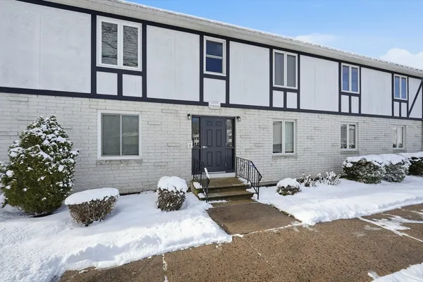 a view of a front of house with outdoor space