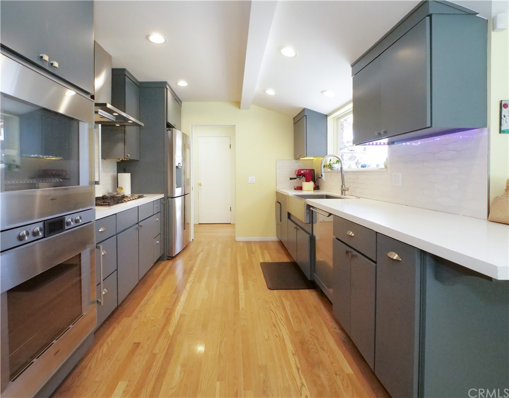 5063 Foxpoint Lane Rolling Hills Estates, CA 90274 - Photo 11 of 35 a large kitchen with stainless steel appliances lots of counter space and a sink
