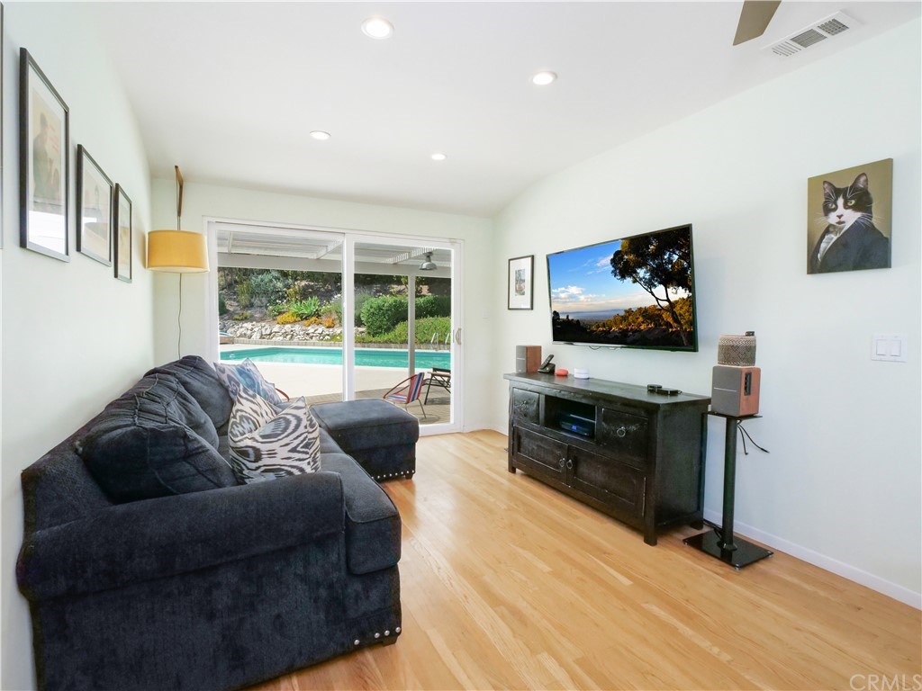 5063 Foxpoint Lane Rolling Hills Estates, CA 90274 - Photo 12 of 35 a living room with furniture and a flat screen tv