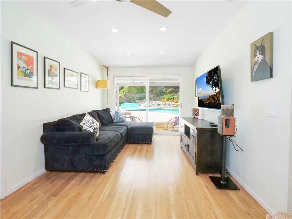 5063 Foxpoint Lane Rolling Hills Estates, CA 90274 - Photo 13 of 35 a living room with furniture and a flat screen tv