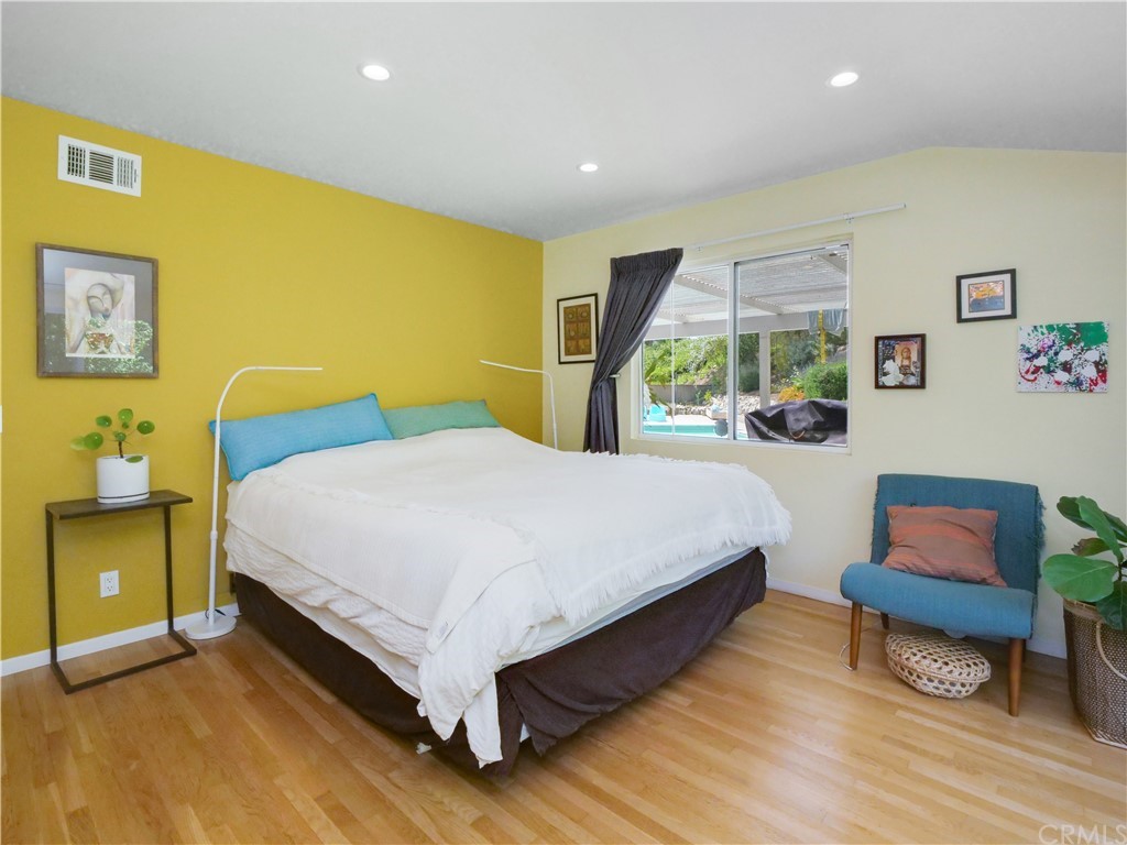 5063 Foxpoint Lane Rolling Hills Estates, CA 90274 - Photo 15 of 35 a bedroom with a bed and a chair