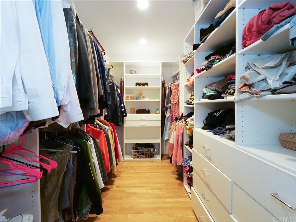 5063 Foxpoint Lane Rolling Hills Estates, CA 90274 - Photo 18 of 35 a view of walk in closet with clothes and shoes