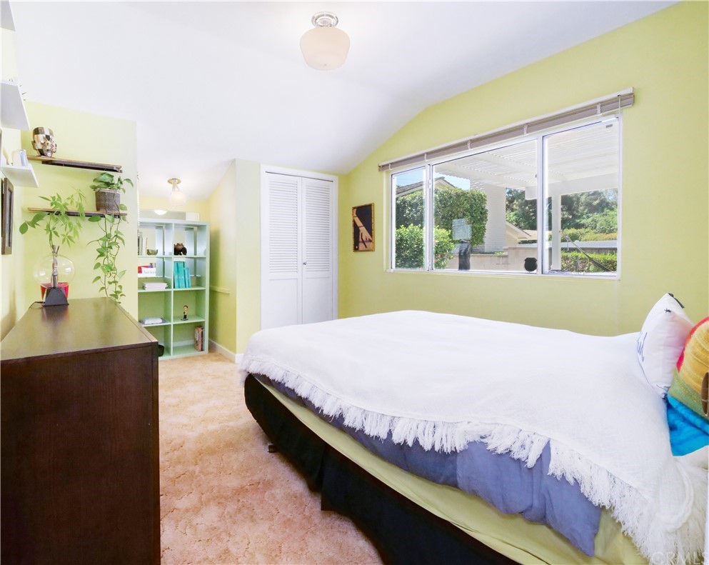 5063 Foxpoint Lane Rolling Hills Estates, CA 90274 - Photo 19 of 35 a bed sitting in a bedroom next to a large window